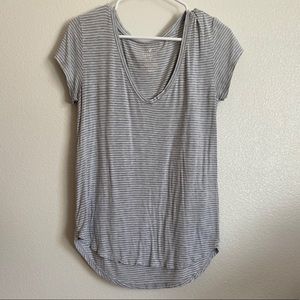 Gray and white striped v-neck shirt